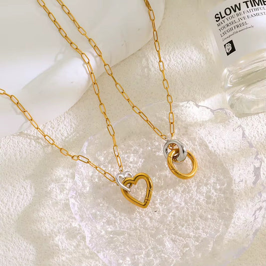 Interlocking Heart Necklace-Elegant interlocking heart necklace in gold and silver tones. Waterproof, tarnish-free and hypoallergenic. A timeless symbol of love.-Dazzledvenus